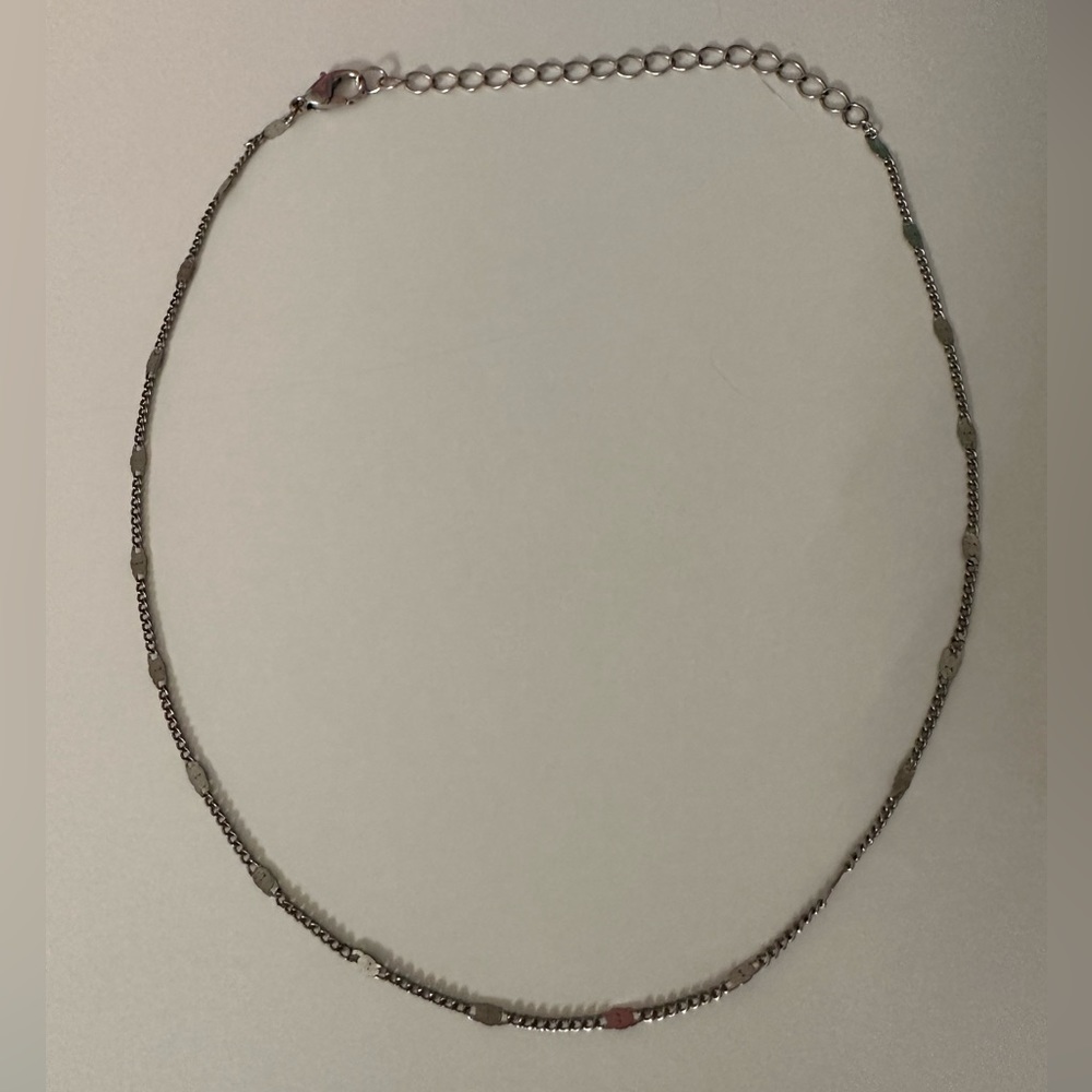 Silver Adjustable Chain Necklace with Small Details.